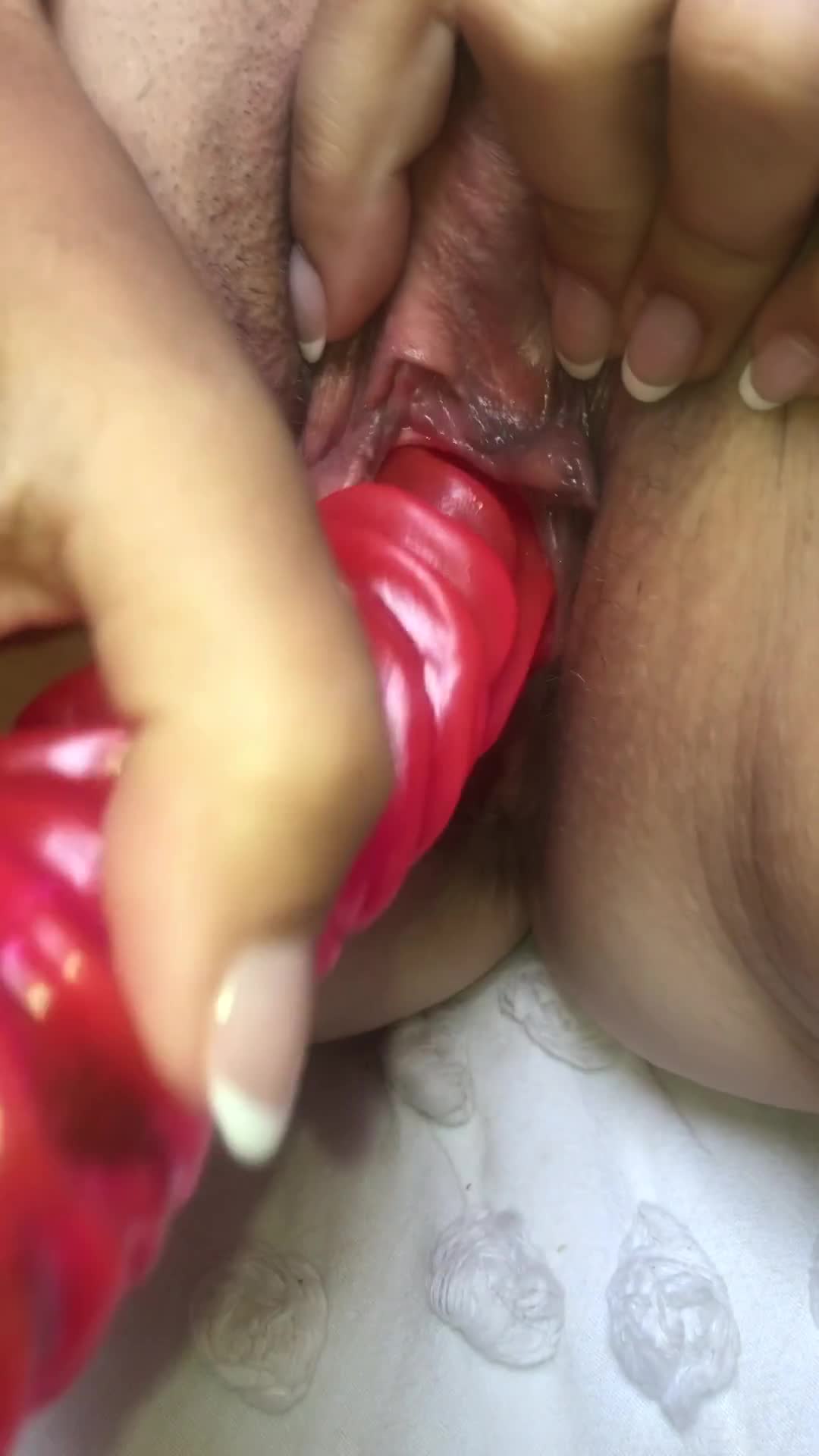 Pic #1She wrapped her beautiful lips around her dildo